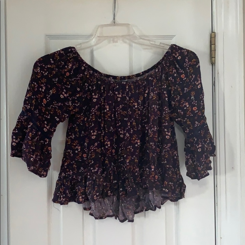 Blue and purple floral off the shoulder shirt.
